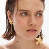 Joyería-Desigual Pendientes largos asimétricos flor baño oro Zalio